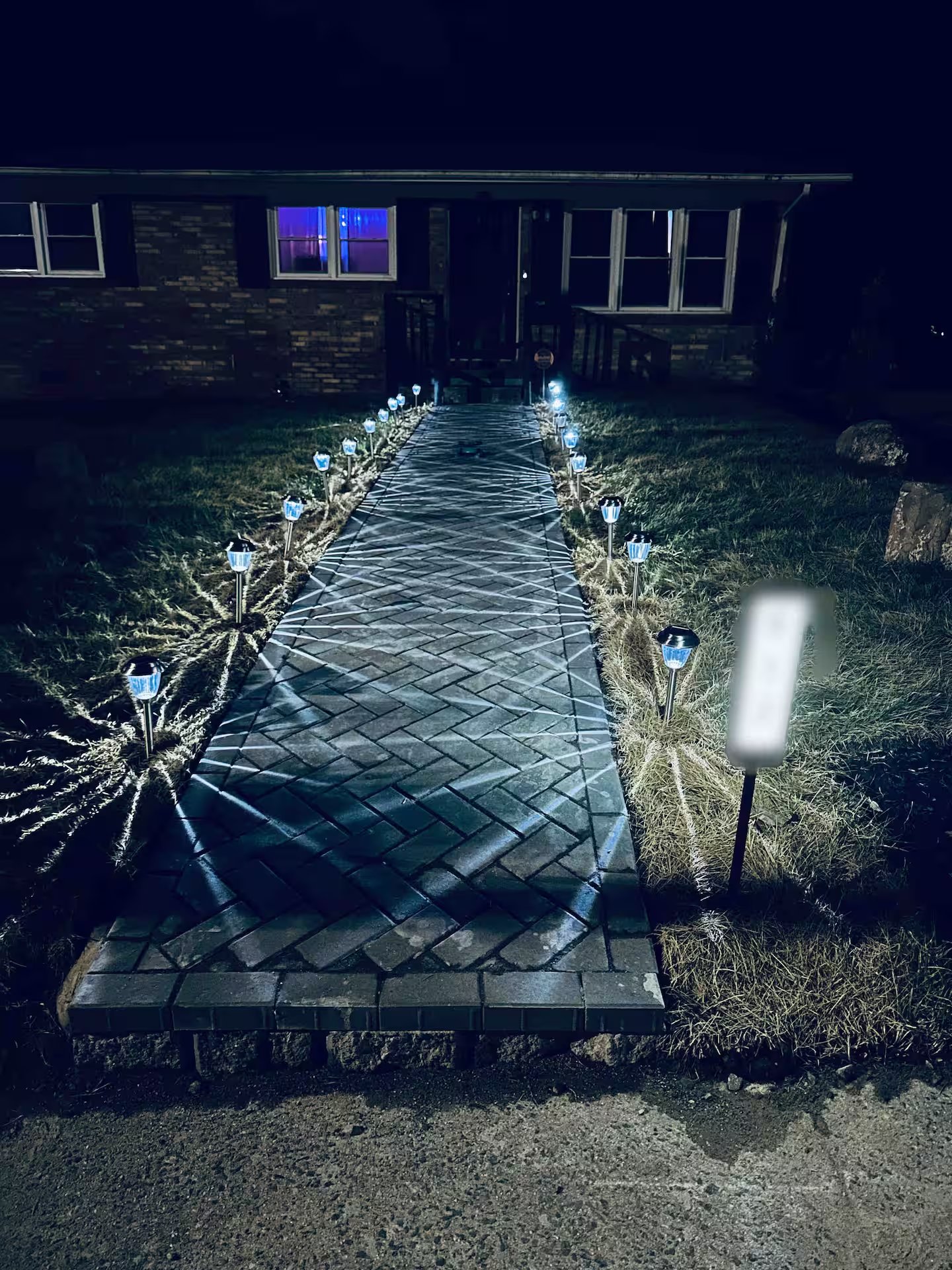 Lit walkway to front entrance